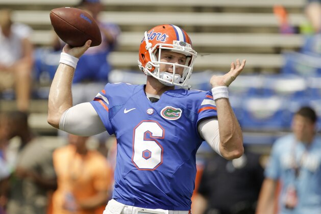 Florida quarterback Jeff Driskel warms up prior to an NCAA college football game against Toledo,  Saturday, Aug. 31, 2013, in Gainesville, Fla. (AP Photo/John Raoux)
