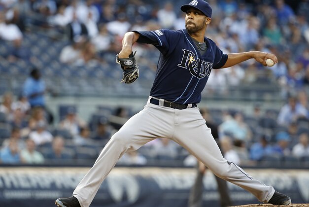 Tampa Bay Rays starting pitcher David Price delivers in the third inning of a baseball game against the New York Yankees at Yankee Stadium in New York, Tuesday, July 1, 2014.  (AP Photo/Kathy Willens)