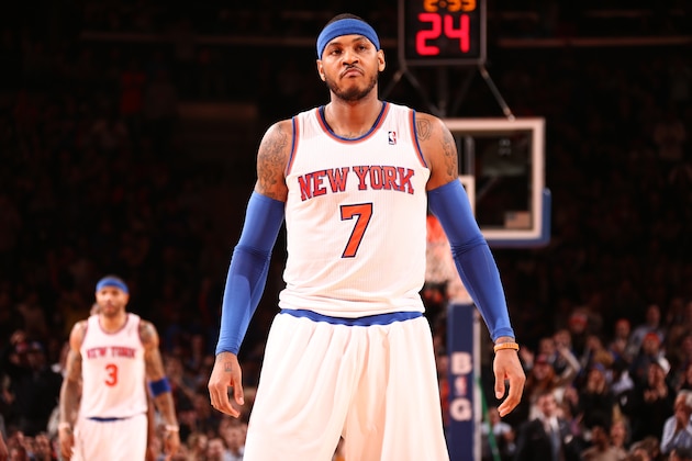 NEW YORK, NY - JANUARY 9: Carmelo Anthony #7 of the New York Knicks reacts during the game against the Miami Heat during a game at Madison Square Garden in New York City on January 9, 2014.  NOTE TO USER: User expressly acknowledges and agrees that, by downloading and or using this photograph, User is consenting to the terms and conditions of the Getty Images License Agreement. Mandatory Copyright Notice: Copyright 2014 NBAE  (Photo by Nathaniel S. Butler/NBAE via Getty Images)