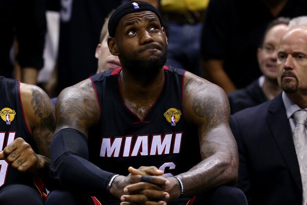 SAN ANTONIO, TX - JUNE 15: LeBron James #6 of the Miami Heat reacts on the bench against the San Antonio Spurs during Game Five of the 2014 NBA Finals at the AT&T Center on June 15, 2014 in San Antonio, Texas. NOTE TO USER: User expressly acknowledges and agrees that, by downloading and or using this photograph, User is consenting to the terms and conditions of the Getty Images License Agreement. (Photo by Andy Lyons/Getty Images) SAN ANTONIO, TX - JUNE 15: LeBron James #6 of the Miami Heat reacts on the bench against the San Antonio Spurs during Game Five of the 2014 NBA Finals at the AT&T Center on June 15, 2014 in San Antonio, Texas. NOTE TO USER: User expressly acknowledges and agrees that, by downloading and or using this photograph, User is consenting to the terms and conditions of the Getty Images License Agreement. (Photo by Andy Lyons/Getty Images)