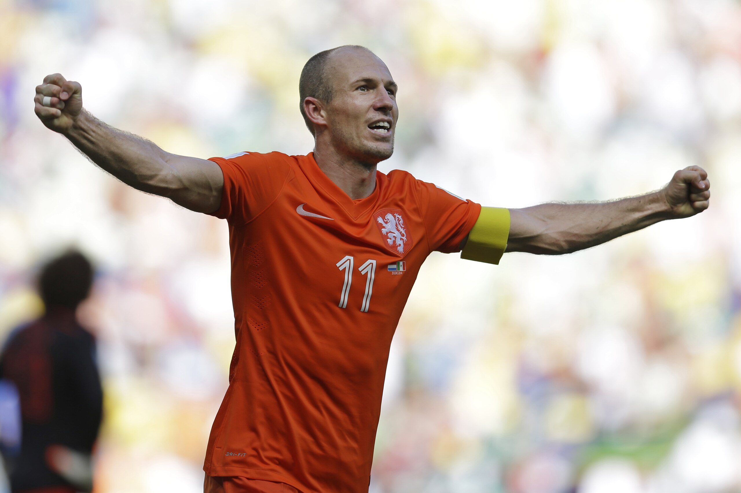 Netherlands' Arjen Robben celebrates after the World Cup round of 16 soccer match between the Netherlands and Mexico at the Arena Castelao in Fortaleza, Brazil, Sunday, June 29, 2014. The Netherlands won the match 2-1. (AP Photo/Natacha Pisarenko)