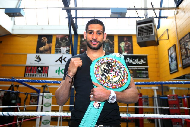 BOLTON, ENGLAND - MAY 12:  Amir Khan poses during the launch of The Amir Khan Foundation at the at the Gloves Community Centre on May 12, 2014 in Bolton, England.  (Photo by Jan Kruger/Getty Images)