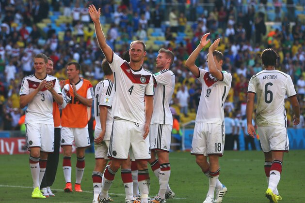 RIO DE JANEIRO, BRAZIL - JULY 04: Benedikt Hoewedes of Germany (center) and teammates acknowledge the fans after a 1-0 victory over France in the 2014 FIFA World Cup Brazil Quarter Final match between France and Germany at Maracana on July 4, 2014 in Rio de Janeiro, Brazil. (Photo by Jamie Squire/Getty Images) RIO DE JANEIRO, BRAZIL - JULY 04: Benedikt Hoewedes of Germany (center) and teammates acknowledge the fans after a 1-0 victory over France in the 2014 FIFA World Cup Brazil Quarter Final match between France and Germany at Maracana on July 4, 2014 in Rio de Janeiro, Brazil. (Photo by Jamie Squire/Getty Images)