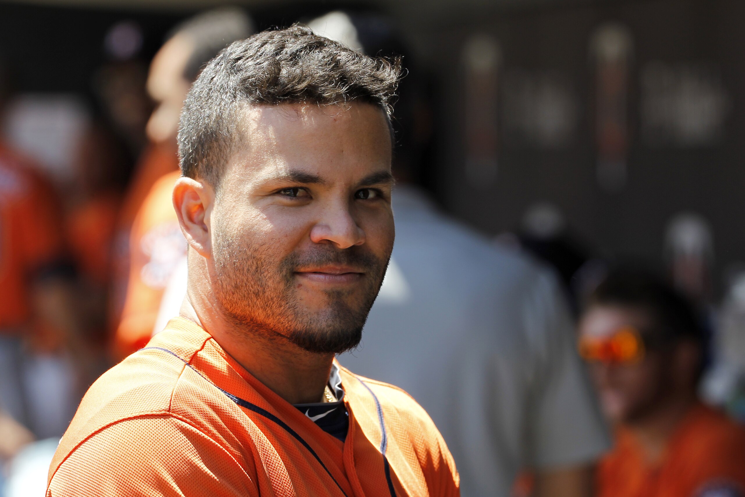 Houston Astros second baseman Jose Altuve smiles in the dugout before a baseball game Minnesota Twins in Minneapolis, Sunday, June 8, 2014. (AP Photo/Ann Heisenfelt)