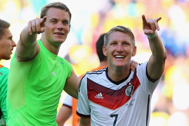 RIO DE JANEIRO, BRAZIL - JULY 04:  Goalkeeper Manuel Neuer and Bastian Schweinsteiger of Germany acknowledge the fans after defeating France 1-0 in the 2014 FIFA World Cup Brazil Quarter Final match between France and Germany at Maracana on July 4, 2014 in Rio de Janeiro, Brazil.  (Photo by Martin Rose/Getty Images)