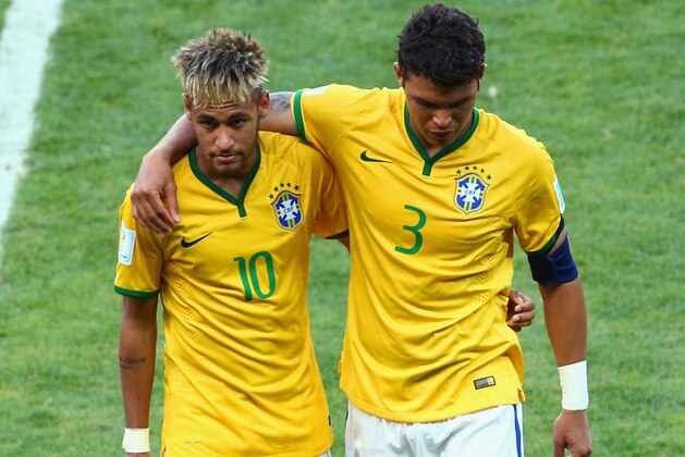 BELO HORIZONTE, BRAZIL - JUNE 28: Neymar and Thiago Silva of Brazil walk off the pitch after defeating Chile in the penalty shootout in the 2014 FIFA World Cup Brazil round of 16 match between Brazil and Chile at Estadio Mineirao on June 28, 2014 in Belo Horizonte, Brazil. (Photo by Ian Walton/Getty Images) BELO HORIZONTE, BRAZIL - JUNE 28: Neymar and Thiago Silva of Brazil walk off the pitch after defeating Chile in the penalty shootout in the 2014 FIFA World Cup Brazil round of 16 match between Brazil and Chile at Estadio Mineirao on June 28, 2014 in Belo Horizonte, Brazil. (Photo by Ian Walton/Getty Images)