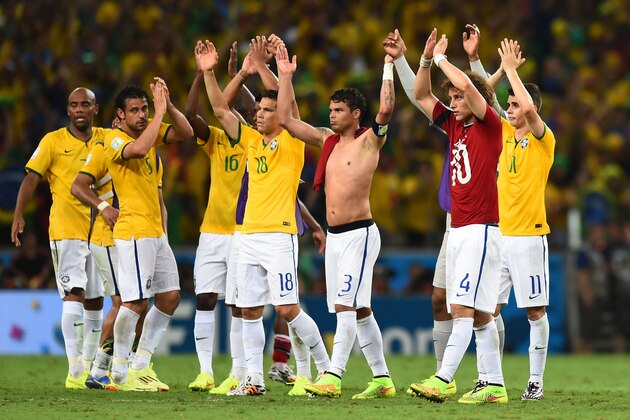 FORTALEZA, BRAZIL - JULY 04: Brazil acknowledge the fans after defeating Colombia 2-1 during the 2014 FIFA World Cup Brazil Quarter Final match between Brazil and Colombia at Castelao on July 4, 2014 in Fortaleza, Brazil.  (Photo by Buda Mendes/Getty Images)