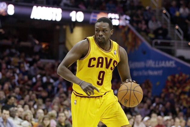 Cleveland Cavaliers' Luol Deng, (9) from Sudan, drives downcourt during an NBA basketball game against the Indiana Pacers Sunday, March 30, 2014, in Cleveland. (AP Photo/Tony Dejak)