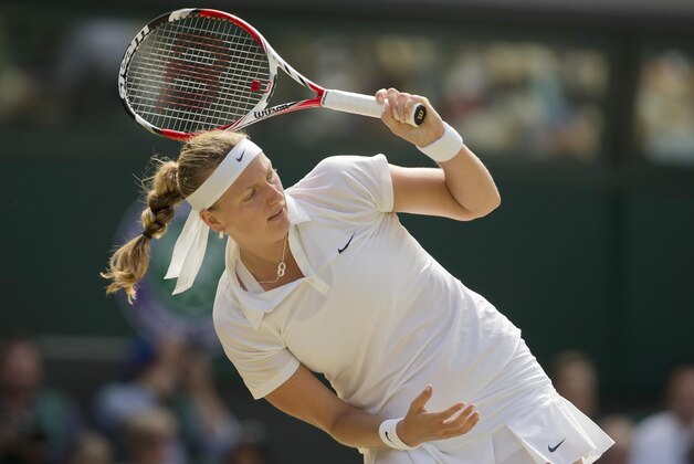 Jul 3, 2014; London, United Kingdom; Petra Kvitova (CZE) reacts during her match against Lucie Safarova (CZE)  on day 10 of the 2014 Wimbledon Championships at the All England Lawn and Tennis Club. Mandatory Credit: Susan Mullane-USA TODAY Sports
