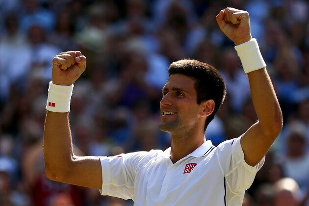LONDON, ENGLAND - JULY 04:  Novak Djokovic of Serbia celebrates after winning his Gentlemen's Singles semi-final match against Grigor Dimitrov of Bulgaria on day eleven of the Wimbledon Lawn Tennis Championships at the All England Lawn Tennis and Croquet Club on July 4, 2014 in London, England.  (Photo by Clive Brunskill/Getty Images)