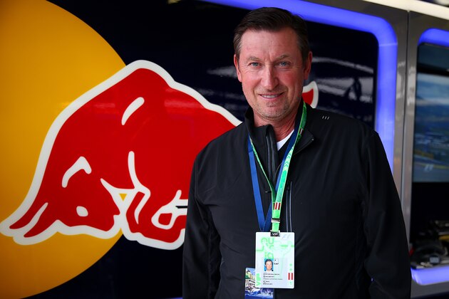 SPIELBERG, AUSTRIA - JUNE 21:  Wayne Gretzky poses in the Infiniti Red Bull Racing garage during final practice ahead of the Austrian Formula One Grand Prix at Red Bull Ring on June 21, 2014 in Spielberg, Austria.  (Photo by Mark Thompson/Getty Images)