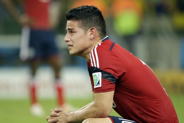 Colombia's James Rodriguez reacts at the end of the World Cup quarterfinal soccer match between Brazil and Colombia at the Arena Castelao in Fortaleza, Brazil, Friday, July 4, 2014. Brazil won 2-1 to reach the semifinals. (AP Photo/Hassan Ammar)