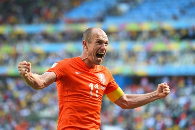 FORTALEZA, BRAZIL - JUNE 29: Arjen Robben of the Netherlands celebrates after defeating Mexico 2-1 during the 2014 FIFA World Cup Brazil Round of 16 match between Netherlands and Mexico at Castelao on June 29, 2014 in Fortaleza, Brazil.  (Photo by Laurence Griffiths/Getty Images)