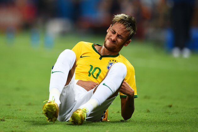FORTALEZA, BRAZIL - JULY 04: Neymar of Brazil reacts after a challenge during the 2014 FIFA World Cup Brazil Quarter Final match between Brazil and Colombia at Castelao on July 4, 2014 in Fortaleza, Brazil. (Photo by Laurence Griffiths/Getty Images) FORTALEZA, BRAZIL - JULY 04: Neymar of Brazil reacts after a challenge during the 2014 FIFA World Cup Brazil Quarter Final match between Brazil and Colombia at Castelao on July 4, 2014 in Fortaleza, Brazil. (Photo by Laurence Griffiths/Getty Images)