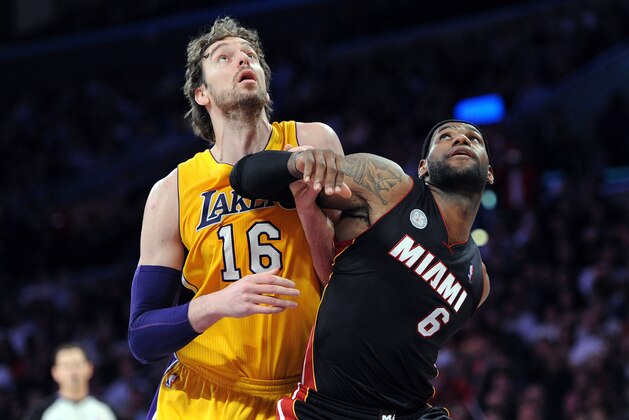 January 17, 2013;  Los Angeles, CA, USA;    Los Angeles Lakers power forward Pau Gasol (16) and Miami Heat small forward LeBron James (6) battle for position under the basket in the second half of the game at the Staples Center. Heat won 99-90. Mandatory Credit: Jayne Kamin-Oncea-USA TODAY Sports