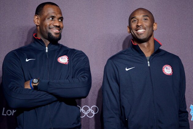 July 27, 2012; London, United Kingdom; USA forward LeBron James (left) and guard Kobe Bryant (right) stand on a stage during a press conference in preparation for the 2012 London Olympic Games at the Main Press Center.  Mandatory Credit: Alain Mounic/Presse Sports via USA TODAY Sports