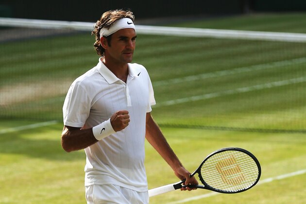 LONDON, ENGLAND - JULY 04: Roger Federer of Switzerland celebrates after winning his Gentlemen's Singles semi-final match against Milos Raonic of Canada on day eleven of the Wimbledon Lawn Tennis Championships at the All England Lawn Tennis and Croquet Club on July 4, 2014 in London, England. (Photo by Matthew Stockman/Getty Images) LONDON, ENGLAND - JULY 04: Roger Federer of Switzerland celebrates after winning his Gentlemen's Singles semi-final match against Milos Raonic of Canada on day eleven of the Wimbledon Lawn Tennis Championships at the All England Lawn Tennis and Croquet Club on July 4, 2014 in London, England. (Photo by Matthew Stockman/Getty Images)