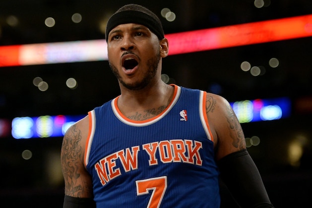 LOS ANGELES, CA - MARCH 25:  Carmelo Anthony #7 of the New York Knicks reacts for a foul during the game against the Los Angeles Lakers at Staples Center on March 25, 2014 in Los Angeles, California.   NOTE TO USER: User expressly acknowledges and agrees that, by downloading and or using this Photograph, user is consenting to the terms and condition of the Getty Images License Agreement.  (Photo by Harry How/Getty Images)