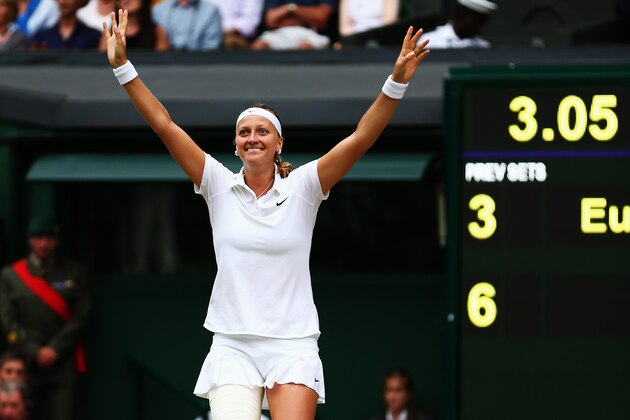 LONDON, ENGLAND - JULY 05:  Petra Kvitova of Czech Republic celebrates championship point and winning the Ladies' Singles final match against Eugenie Bouchard of Canada on day twelve of the Wimbledon Lawn Tennis Championships at the All England Lawn Tennis and Croquet Club on July 5, 2014 in London, England.  (Photo by Clive Brunskill/Getty Images)