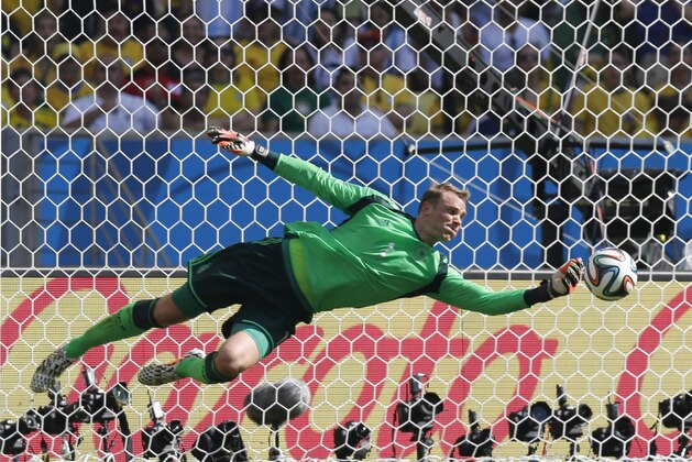Germany's goalkeeper Manuel Neuer saves a shot from France's Mathieu Valbuena,  during the World Cup quarterfinal soccer match between Germany and France at the Maracana Stadium in Rio de Janeiro, Brazil, Friday, July 4, 2014. (AP Photo/Frank Augstein)