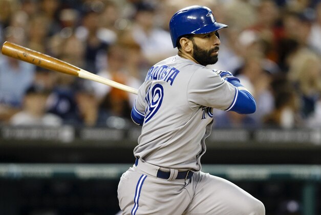 Jun 3, 2014; Detroit, MI, USA; Toronto Blue Jays right fielder Jose Bautista (19) hits an RBI single in the ninth inning against the Detroit Tigers at Comerica Park. Toronto won 5-3. Mandatory Credit: Rick Osentoski-USA TODAY Sports