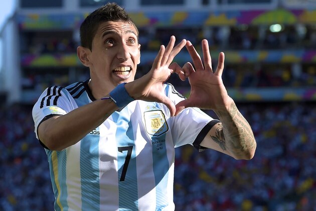 SAO PAULO, BRAZIL - JULY 01:  Angel di Maria of Argentina celebrates scoring his team's first goal in extra time during the 2014 FIFA World Cup Brazil Round of 16 match between Argentina and Switzerland at Arena de Sao Paulo on July 1, 2014 in Sao Paulo, Brazil.  (Photo by Julian Finney/Getty Images)