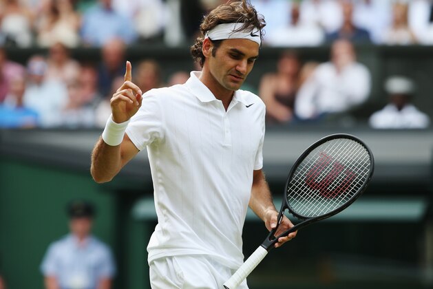LONDON, ENGLAND - JULY 02: Roger Federer of Switzerland celebrates during his Gentlemen's Singles quarter-final match against Stan Wawrinka of Switzerland on day nine of the Wimbledon Lawn Tennis Championships at the All England Lawn Tennis and Croquet Club at Wimbledon on July 2, 2014 in London, England. (Photo by Jan Kruger/Getty Images) LONDON, ENGLAND - JULY 02: Roger Federer of Switzerland celebrates during his Gentlemen's Singles quarter-final match against Stan Wawrinka of Switzerland on day nine of the Wimbledon Lawn Tennis Championships at the All England Lawn Tennis and Croquet Club at Wimbledon on July 2, 2014 in London, England. (Photo by Jan Kruger/Getty Images)