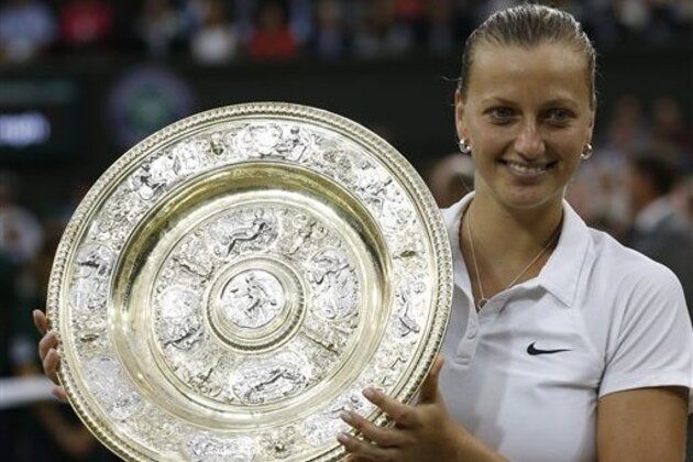 Petra Kvitova of Czech Republic holds the trophy after winning the women's singles final against Eugenie Bouchard of Canada at the All England Lawn Tennis Championships in Wimbledon, London, Saturday, July 5, 2014. (AP Photo/Sang Tan) Petra Kvitova of Czech Republic holds the trophy after winning the women's singles final against Eugenie Bouchard of Canada at the All England Lawn Tennis Championships in Wimbledon, London, Saturday, July 5, 2014. (AP Photo/Sang Tan)