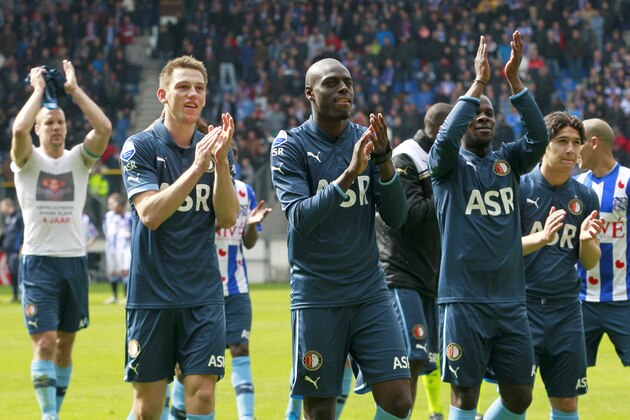HEERENVEEN, NETHERLANDS - MAY 6: (From L to R) Ron Vlaar, Stefan de Vrij, Bruno Martins Indi, Elvis Manu and Annas Achahbar of Feyenoord applaud the supporters during the Dutch Eredivisie match between sc Heerenveen and Feyenoord held on May 6, 2012 at the Abe Lenstra Stadion in Heerenveen, Netherlands. (Photo by Vincent Jannink/EuroFootball/Getty Images) HEERENVEEN, NETHERLANDS - MAY 6: (From L to R) Ron Vlaar, Stefan de Vrij, Bruno Martins Indi, Elvis Manu and Annas Achahbar of Feyenoord applaud the supporters during the Dutch Eredivisie match between sc Heerenveen and Feyenoord held on May 6, 2012 at the Abe Lenstra Stadion in Heerenveen, Netherlands. (Photo by Vincent Jannink/EuroFootball/Getty Images)