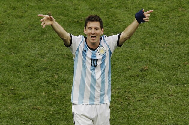 Argentina's Lionel Messi celebrates at the end of the World Cup quarterfinal soccer match between Argentina and Belgium at the Estadio Nacional in Brasilia, Brazil, Saturday, July 5, 2014. Argentina won 1-0. (AP Photo/Thanassis Stavrakis)