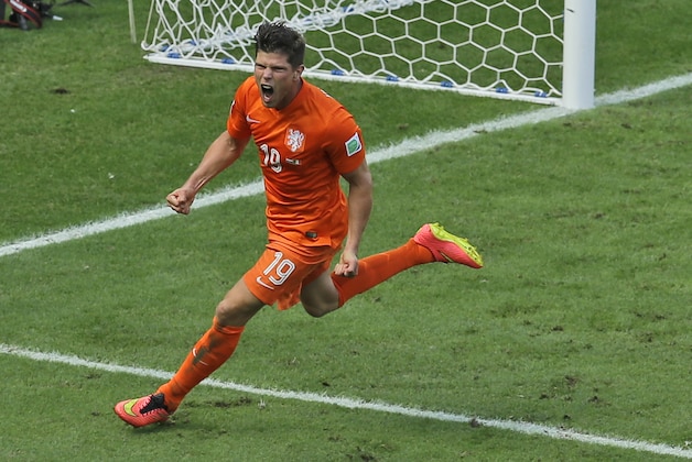 Netherlands' Klaas-Jan Huntelaar celebrates after scoring his side's second goal from the penalty spot during the World Cup round of 16 soccer match between the Netherlands and Mexico at the Arena Castelao in Fortaleza, Brazil, Sunday, June 29, 2014. Holland won 2-1 and advanced to the quarterfinal. (AP Photo/Themba Hadebe)