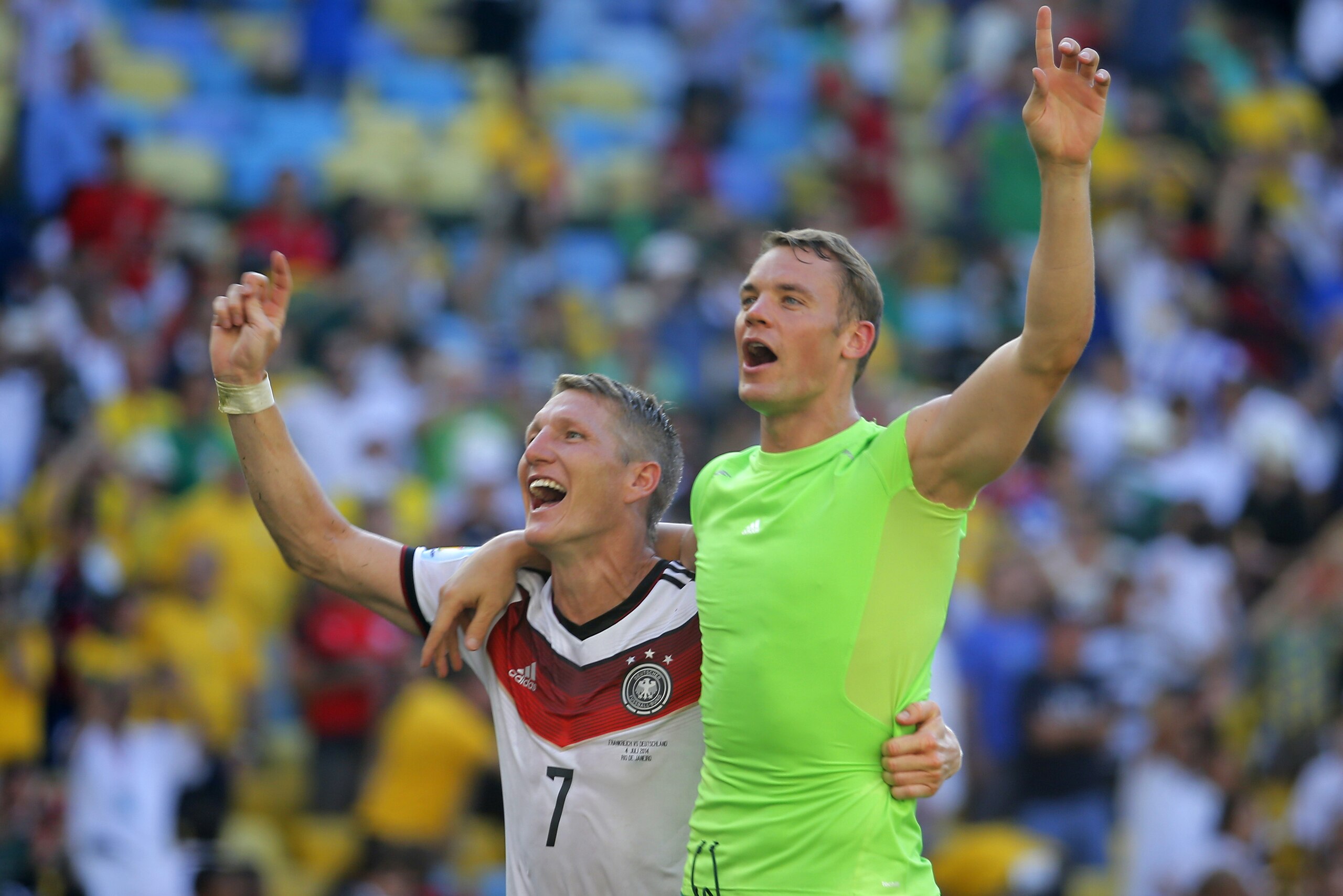 Germany's Bastian Schweinsteiger, left, and Germany's goalkeeper Manuel Neuer celebrate after the World Cup quarterfinal soccer match between Germany and France at the Maracana Stadium in Rio de Janeiro, Brazil, Friday, July 4, 2014. Germany won the match 1-0. (AP Photo/David Vincent) Germany's Bastian Schweinsteiger, left, and Germany's goalkeeper Manuel Neuer celebrate after the World Cup quarterfinal soccer match between Germany and France at the Maracana Stadium in Rio de Janeiro, Brazil, Friday, July 4, 2014. Germany won the match 1-0. (AP Photo/David Vincent)