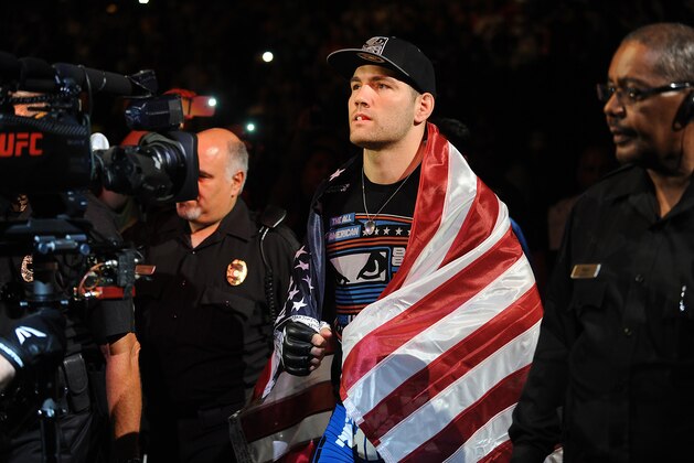 Jul 5, 2014; Las Vegas, NV, USA; Chris Weidman gets ready to enter the octagon for a middleweight title fight against Lyoto Machida at Mandalay Bay Events Center. Mandatory Credit: Stephen R. Sylvanie-USA TODAY Sports
