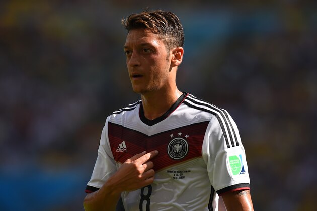 RIO DE JANEIRO, BRAZIL - JULY 04: Mesut Oezil of Germany looks on during the 2014 FIFA World Cup Brazil Quarter Final match between France and Germany at Maracana on July 4, 2014 in Rio de Janeiro, Brazil. (Photo by Matthias Hangst/Getty Images) RIO DE JANEIRO, BRAZIL - JULY 04: Mesut Oezil of Germany looks on during the 2014 FIFA World Cup Brazil Quarter Final match between France and Germany at Maracana on July 4, 2014 in Rio de Janeiro, Brazil. (Photo by Matthias Hangst/Getty Images)