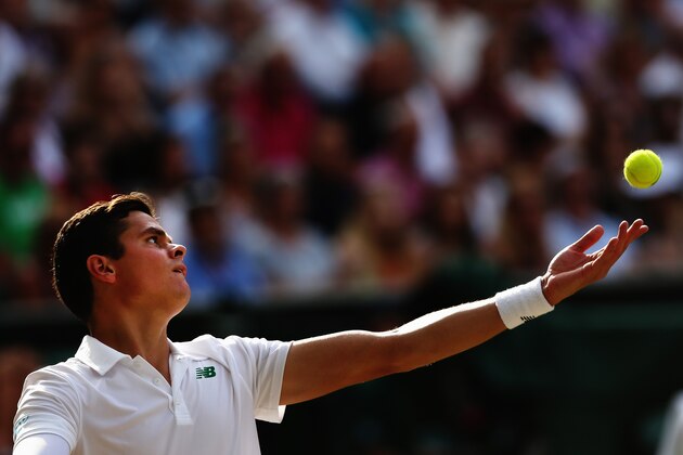 LONDON, ENGLAND - JULY 04:  Milos Raonic of Canada during his Gentlemen's Singles semi-final match against Roger Federer of Switzerland on day eleven of the Wimbledon Lawn Tennis Championships at the All England Lawn Tennis and Croquet Club on July 4, 2014 in London, England.  (Photo by Matthew Stockman/Getty Images)