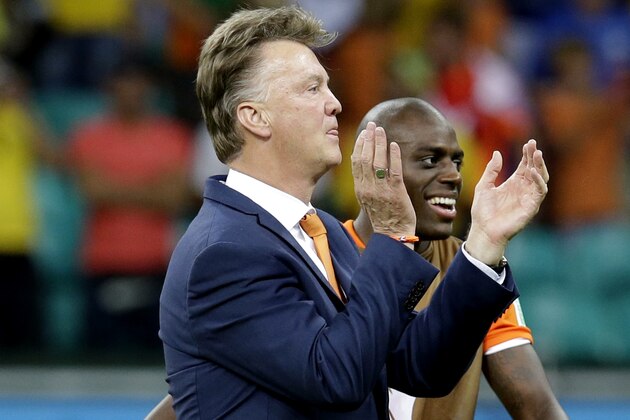Netherlands' head coach Louis van Gaal celebrates after the World Cup quarterfinal soccer match between the Netherlands and Costa Rica at the Arena Fonte Nova in Salvador, Brazil, Saturday, July 5, 2014. The Netherlands won 4-3 on penalty kicks. (AP Photo/Hassan Ammar)
