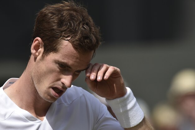 Andy Murray of Britain wipes his brow after playing a point against Grigor Dimitrov of Bulgaria during their men's singles quarterfinal match at the All England Lawn Tennis Championships in Wimbledon, London, Wednesday July 2, 2014. (AP Photo/Toby Melville, Pool) Andy Murray of Britain wipes his brow after playing a point against Grigor Dimitrov of Bulgaria during their men's singles quarterfinal match at the All England Lawn Tennis Championships in Wimbledon, London, Wednesday July 2, 2014. (AP Photo/Toby Melville, Pool)