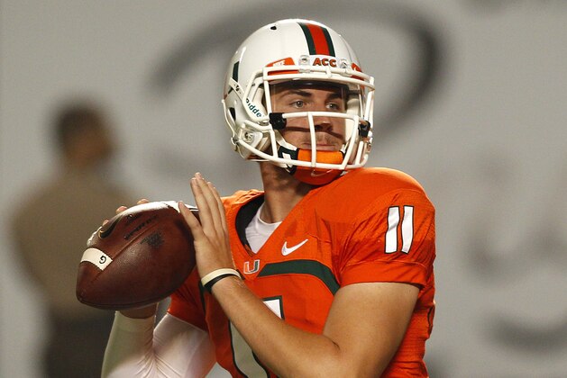 Sep 21, 2013; Miami Gardens, FL, USA;  Miami Hurricanes quarterback Ryan Williams (11) drops back to pass against the Savannah State Tigers in the second quarter at Sun Life Stadium. Mandatory Credit: Robert Mayer-USA TODAY Sports