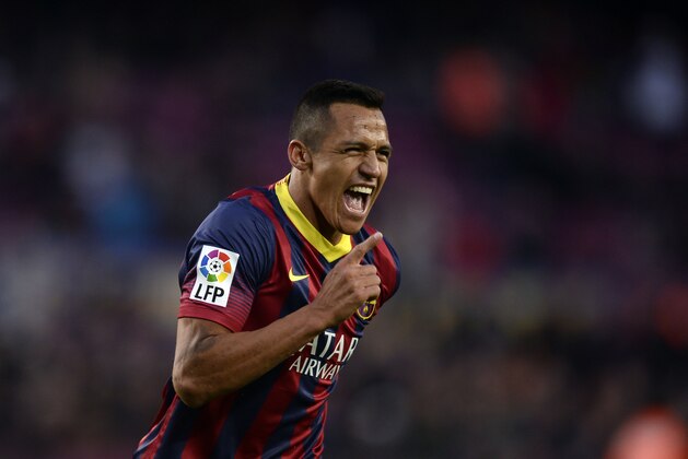 FC Barcelona's Alexis Sanchez reacts after scoring against Elche during a Spanish La Liga soccer match at the Camp Nou stadium in Barcelona, Spain, Sunday, Jan 5, 2014. (AP Photo/Manu Fernandez)