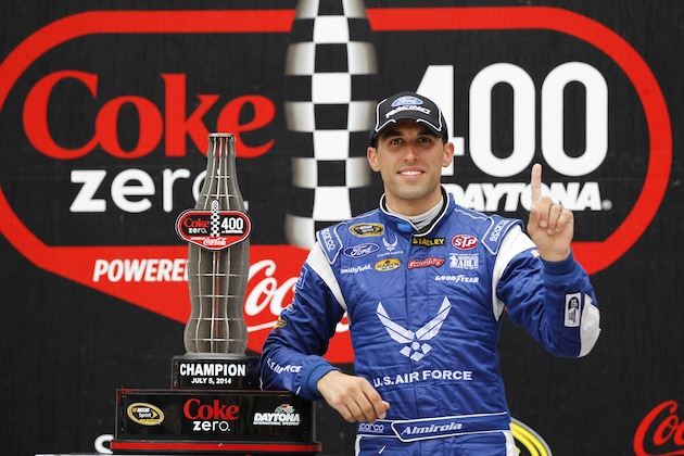 Aric Almirola celebrates in Victory Lane with the winning trophy after winning the NASCAR Sprint cup Series auto race at Daytona International Speedway in Daytona Beach, Fla., Sunday, July 6, 2014. (AP Photo/Terry Renna) Aric Almirola celebrates in Victory Lane with the winning trophy after winning the NASCAR Sprint cup Series auto race at Daytona International Speedway in Daytona Beach, Fla., Sunday, July 6, 2014. (AP Photo/Terry Renna)