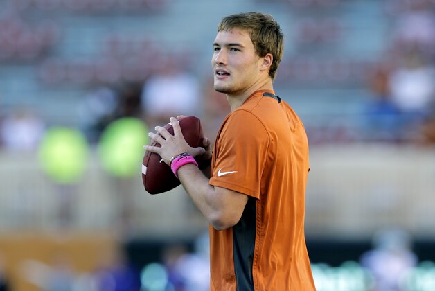 Texas' David Ash throws prior to an NCAA college football game against Kansas State, Saturday,  Sept. 21, 2013, in Austin, Texas. (AP Photo/Eric Gay)