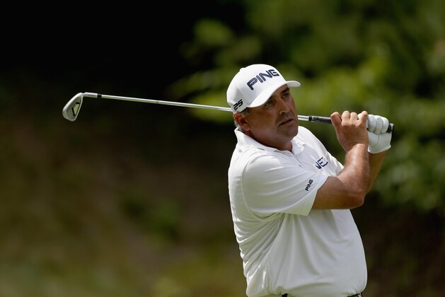 WHITE SULPHUR SPRINGS, WV - JULY 06: Angel Cabrera of Argentina tees off on the seventh hole during the final round of the Greenbrier Classic at the Old White TPC on July 6, 2014 in White Sulphur Springs, West Virginia.  (Photo by Todd Warshaw/Getty Images)