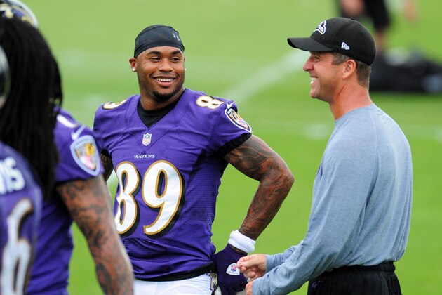 Jun 19, 2014; Baltimore, MD, USA; Baltimore Ravens wide receiver Steve Smith, Sr. (89) talks with head coach John Harbaugh (right) during minicamp at the Under Armour Performance Center. Mandatory Credit: Evan Habeeb-USA TODAY Sports