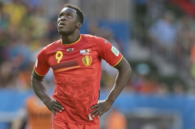 Belgium's Romelu Lukaku, center, reacts after the World Cup quarterfinal soccer match between Argentina and Belgium at the Estadio Nacional in Brasilia, Brazil, Saturday, July 5, 2014. Argentina won the match 1-0.  (AP Photo/Frank Augstein)