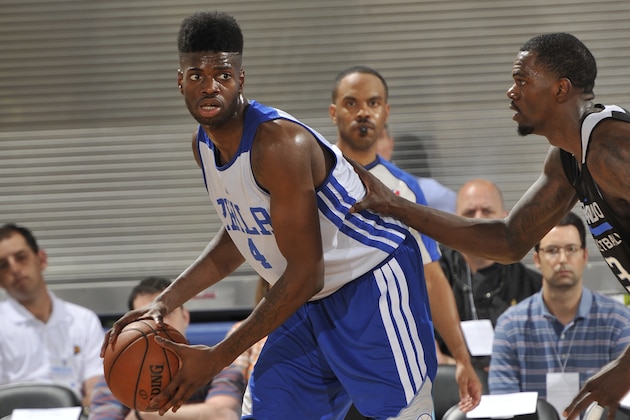 ORLANDO, FL - JULY 5: Nerlens Noel #4 of the Philadelphia 76ers handles the ball against the Orlando Magic on July 5, 2014 at Amway Center in Orlando, Florida. NOTE TO USER: User expressly acknowledges and agrees that, by downloading and or using this photograph, User is consenting to the terms and conditions of the Getty Images License Agreement. Mandatory Copyright Notice: Copyright 2014 NBAE  (Photo by Fernando Medina/NBAE via Getty Images)