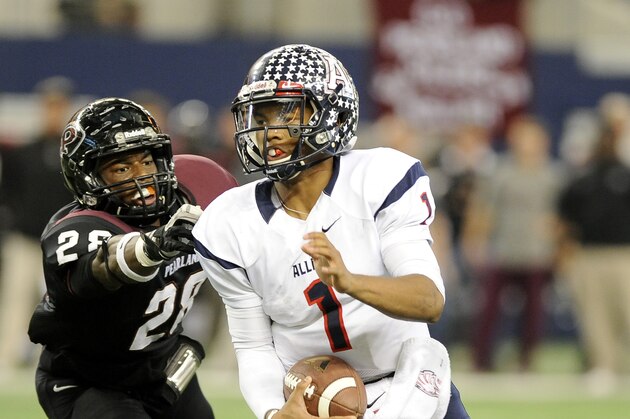 Allen quarterback Kyler Murray (1) runs upfield past Pearland Marlon Walls (28) in the first half during a UIL Class 5A Division I high school football championship game on Saturday Dec. 21, 2013, in Arlington, Texas. (AP Photo/Matt Strasen)
