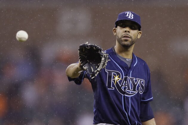 Tampa Bay Rays starting pitcher David Price waits on the throw from catcher Jose Molina during the ninth inning of a baseball game against the Detroit Tigers in Detroit, Sunday, July 6, 2014. (AP Photo/Carlos Osorio) Tampa Bay Rays starting pitcher David Price waits on the throw from catcher Jose Molina during the ninth inning of a baseball game against the Detroit Tigers in Detroit, Sunday, July 6, 2014. (AP Photo/Carlos Osorio)