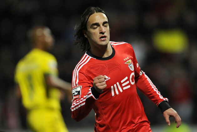 Benfica's Lazar Markovic, from Serbia, reacts as he celebrates after scoring his side's second goal against Pacos Ferreira in a Portuguese League soccer match at Mata Real stadium in Pacos de Ferreira, northern Portugal, Sunday, Feb. 16, 2014. (AP Photo/Paulo Duarte) Benfica's Lazar Markovic, from Serbia, reacts as he celebrates after scoring his side's second goal against Pacos Ferreira in a Portuguese League soccer match at Mata Real stadium in Pacos de Ferreira, northern Portugal, Sunday, Feb. 16, 2014. (AP Photo/Paulo Duarte)