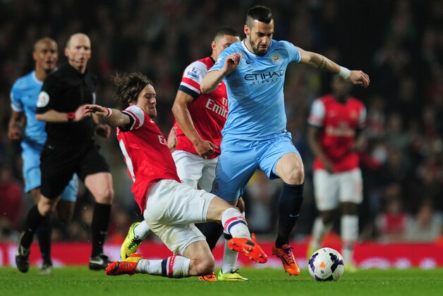 LONDON, ENGLAND - MARCH 29: Alvaro Negredo of Manchester City is closed down by Tomas Rosicky and Alex Oxlade-Chamberlain of Arsenal during the Barclays Premier League match between Arsenal and Manchester City at Emirates Stadium on March 29, 2014 in London, England. (Photo by Shaun Botterill/Getty Images) LONDON, ENGLAND - MARCH 29: Alvaro Negredo of Manchester City is closed down by Tomas Rosicky and Alex Oxlade-Chamberlain of Arsenal during the Barclays Premier League match between Arsenal and Manchester City at Emirates Stadium on March 29, 2014 in London, England. (Photo by Shaun Botterill/Getty Images)