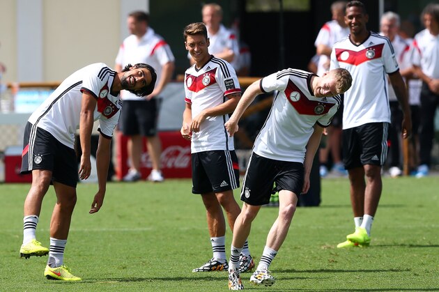 SANTO ANDRE, BRAZIL - JULY 05: Sami Khedira (L) of Germany jokes with team mate Andre Schuerrle during the German national team training at Campo Bahia on July 5, 2014 in Santo Andre, Brazil.  (Photo by Martin Rose/Getty Images)